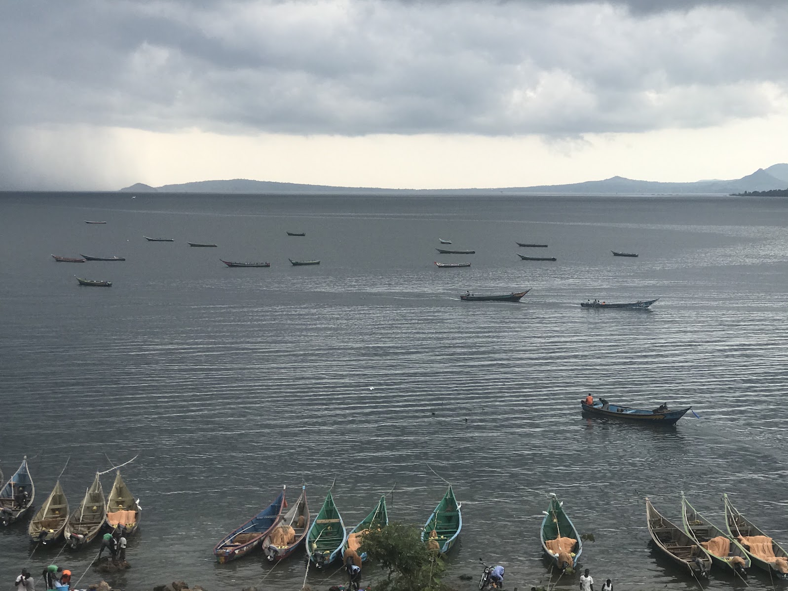 Fishing boats on calm lake waters
